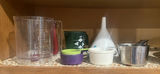 Assorted Glass Jars, Measuring Cups, Funnel, and Pottery Kitchenware - thumbnail 2 of 5
