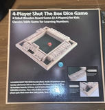 Wooden Dice Game, Framed Art Pieces, and Assorted Magazines - thumbnail 1 of 10