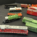 Assorted Model Train Cars, Locomotives, and Toy Airplanes - thumbnail 5 of 6