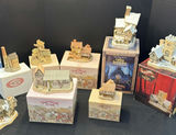 David Winter Cottages and Christmas Carol Collectible Buildings - thumbnail 1 of 8