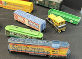 Assorted Model Train Cars, Locomotives, and Toy Airplanes - thumbnail 2 of 6