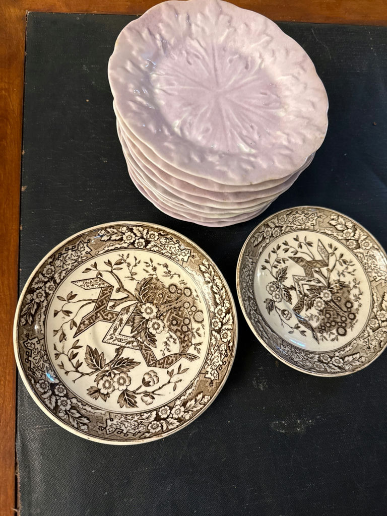 Brown transferware bowls and pink plates - image 1 of 2