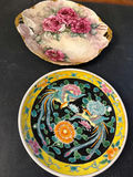 Two decorative porcelain plates with floral and bird motifs - thumbnail 1 of 3