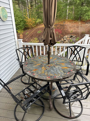 Round mosaic patio table with umbrella and metal chairs - Image 1 of 4