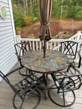 Round mosaic patio table with umbrella and metal chairs - thumbnail 1 of 4