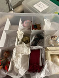 Assorted Christmas ornaments in a multi-compartment storage box - thumbnail 1 of 4