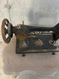 Antique Singer sewing machine with ornate decals. Bring help to carry - thumbnail 2 of 3