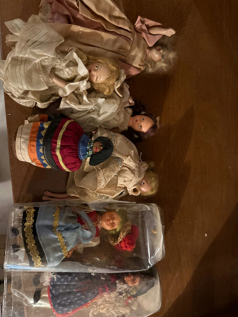 Collection of vintage dolls in elaborate dresses - image 1 of 4