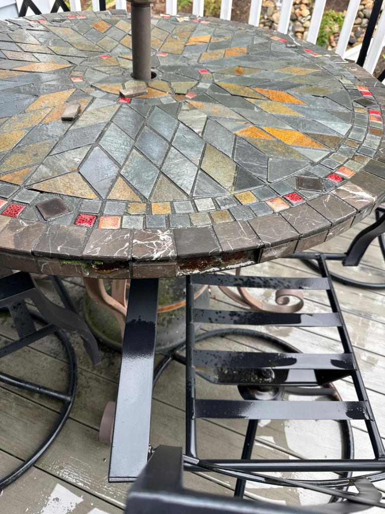 Round mosaic patio table with umbrella and metal chairs - image 2 of 4