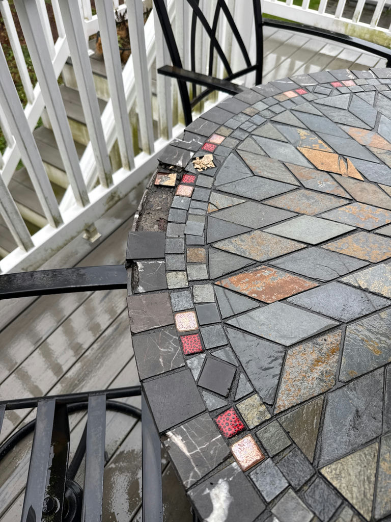 Round mosaic patio table with umbrella and metal chairs - image 3 of 4