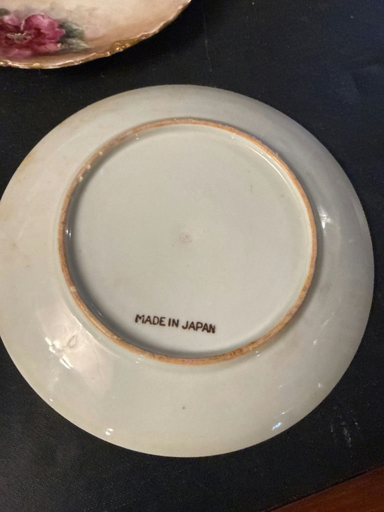 Two decorative porcelain plates with floral and bird motifs - image 2 of 3