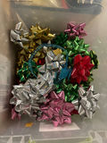 Assorted gift-wrapping ribbons, bows, and holiday embellishments - thumbnail 2 of 3