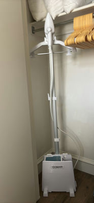 Garment Steamer, Steam Iron, Ironing Board, Clothes Hangers, and Pillows - Image 1 of 5