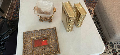 Ornate Framed Artwork, Decorative Glass Bowl, and Gold Book-Shaped Decor - Image 1 of 4