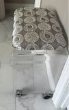Clear acrylic stool with silver circular-patterned cushion and gold decorative sculptures - thumbnail 3 of 5