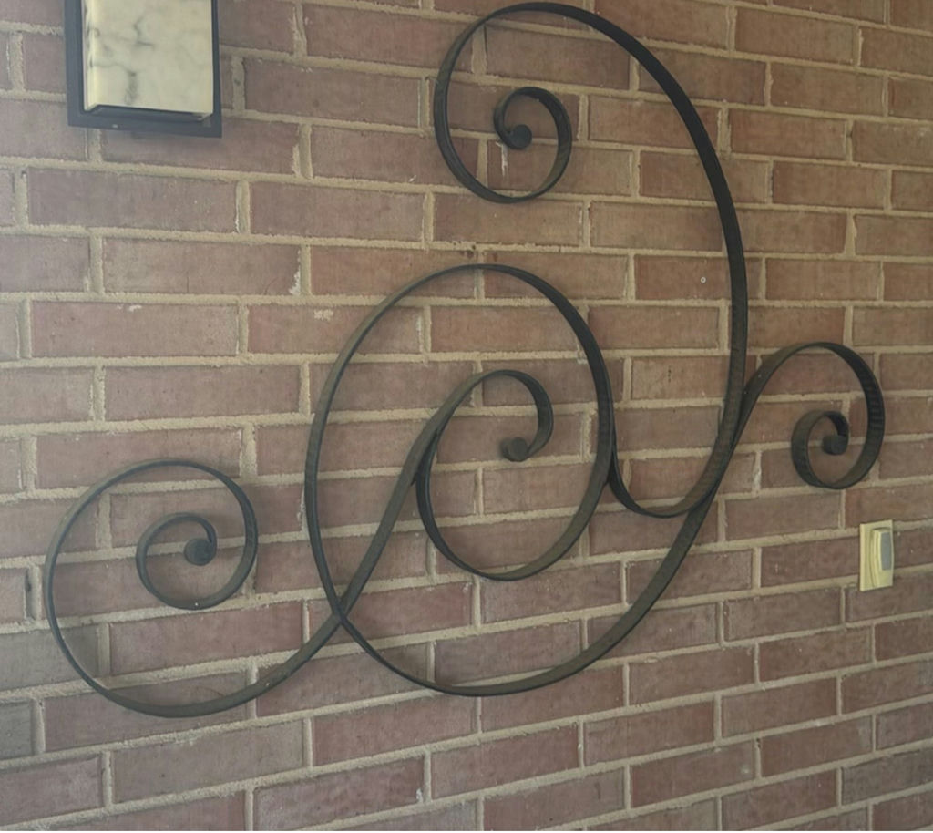 Wrought-iron spiral wall sculpture - image 1 of 3