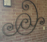 Wrought-iron spiral wall sculpture - thumbnail 1 of 3