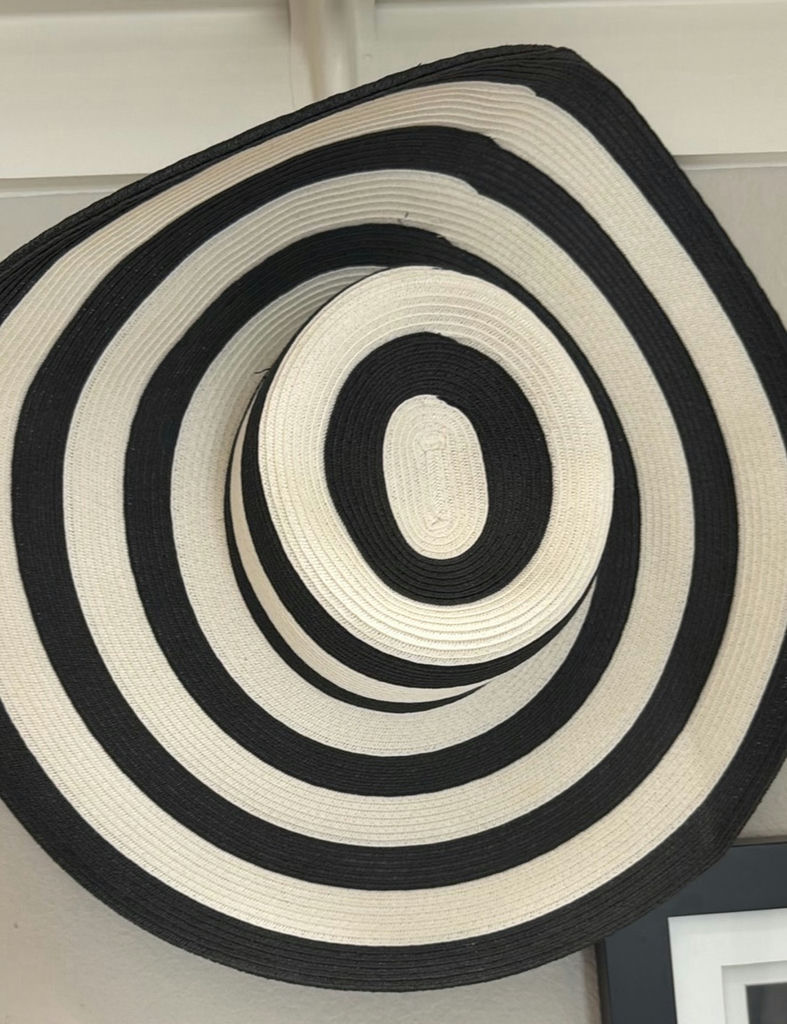 Two framed prints and a black & white striped woven hat. - image 7 of 7