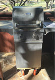 Saber gas grill with propane tank and cleaning supplies - thumbnail 1 of 6