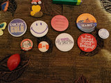 Assorted decorative pins, badges, magnets, and small trinkets - thumbnail 4 of 7