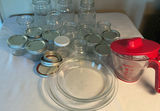 Assorted Mason Jars, Lids, Rings, and Measuring Pitcher - thumbnail 1 of 4