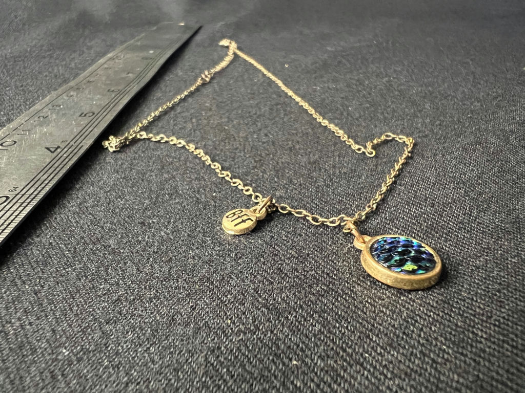 Silver-toned necklace with iridescent round pendant and 'BFF' charm - image 6 of 6