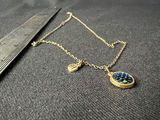 Silver-toned necklace with iridescent round pendant and 'BFF' charm - thumbnail 6 of 6