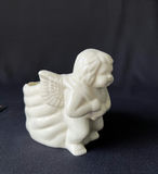 Terracotta baby with miniature tea set and white winged angel figurine - thumbnail 5 of 6
