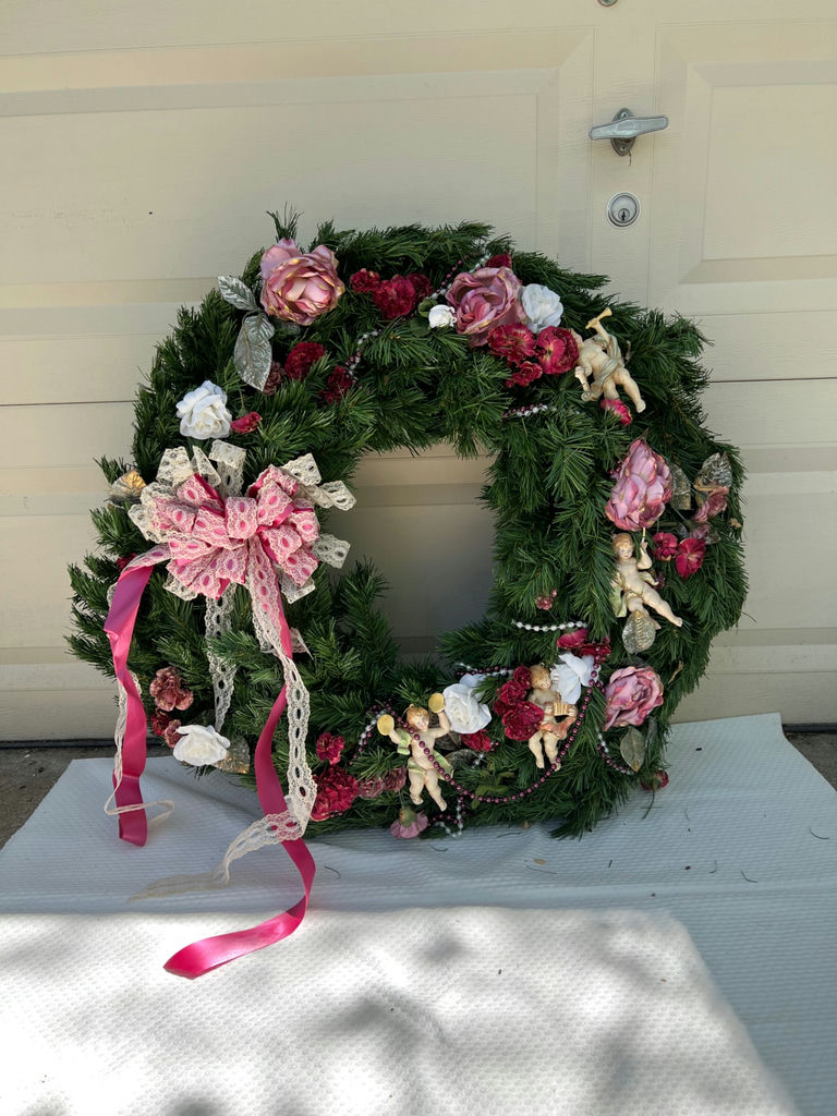Vintage Evergreen Christmas cherub wreath and decorative greens with candle and vases - image 1 of 12