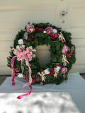 Vintage Evergreen Christmas cherub wreath and decorative greens with candle and vases - thumbnail 1 of 12