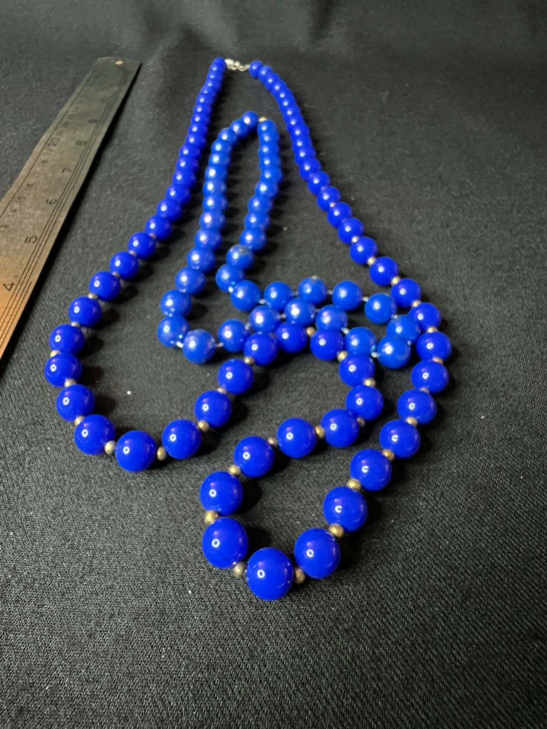 Beaded necklace collection in blue, black and gold tones - image 1 of 12