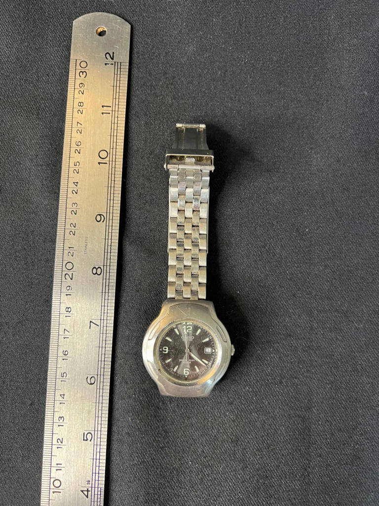 Vintage Casio Edifice EF-104 quartz watch and Vintage eagle-embossed lighter - image 4 of 8