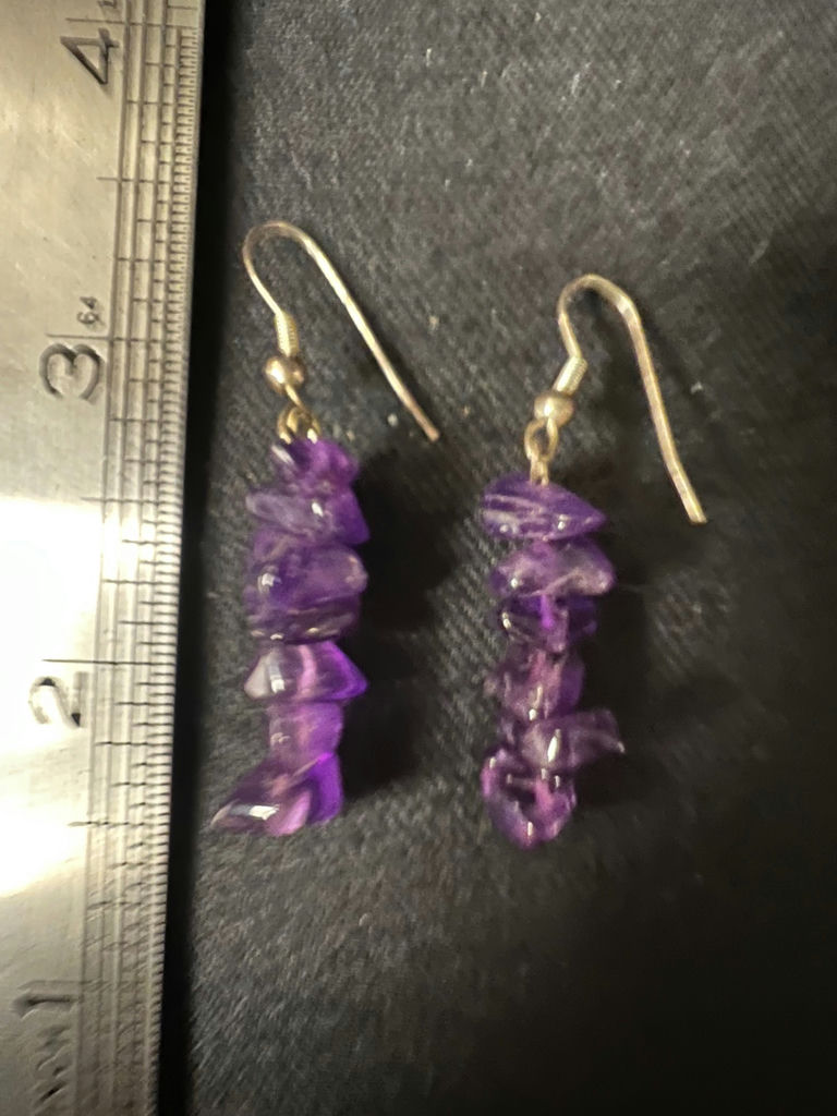 Gold-tone cameo pendant necklace with floral center, purple chip earrings, and two-tone circular earrings - image 7 of 11