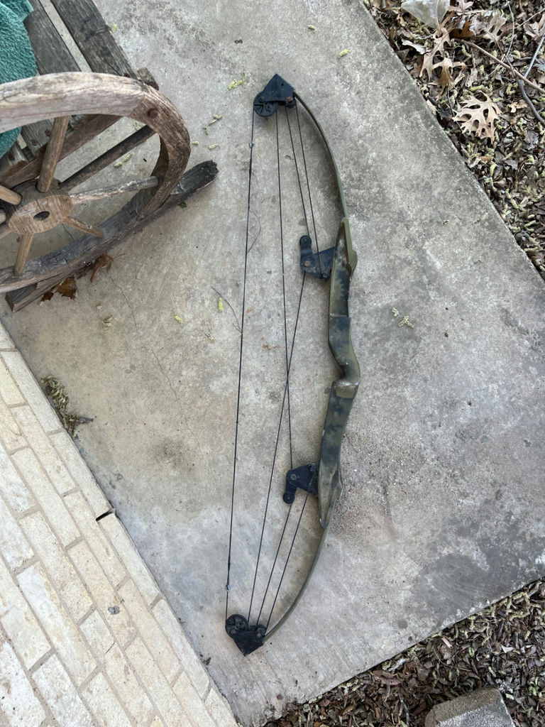 Antique horse bit and Winchester compound bow - image 5 of 7
