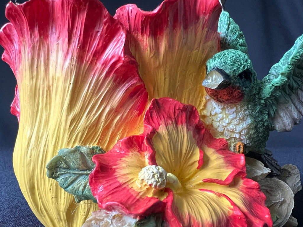 Colorful flower sculpture with hummingbird and cowboy figurine - image 3 of 11