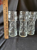 Three tall ribbed glass tiki glasses, round candle holder, and two star-shaped glass candle holders - thumbnail 1 of 10