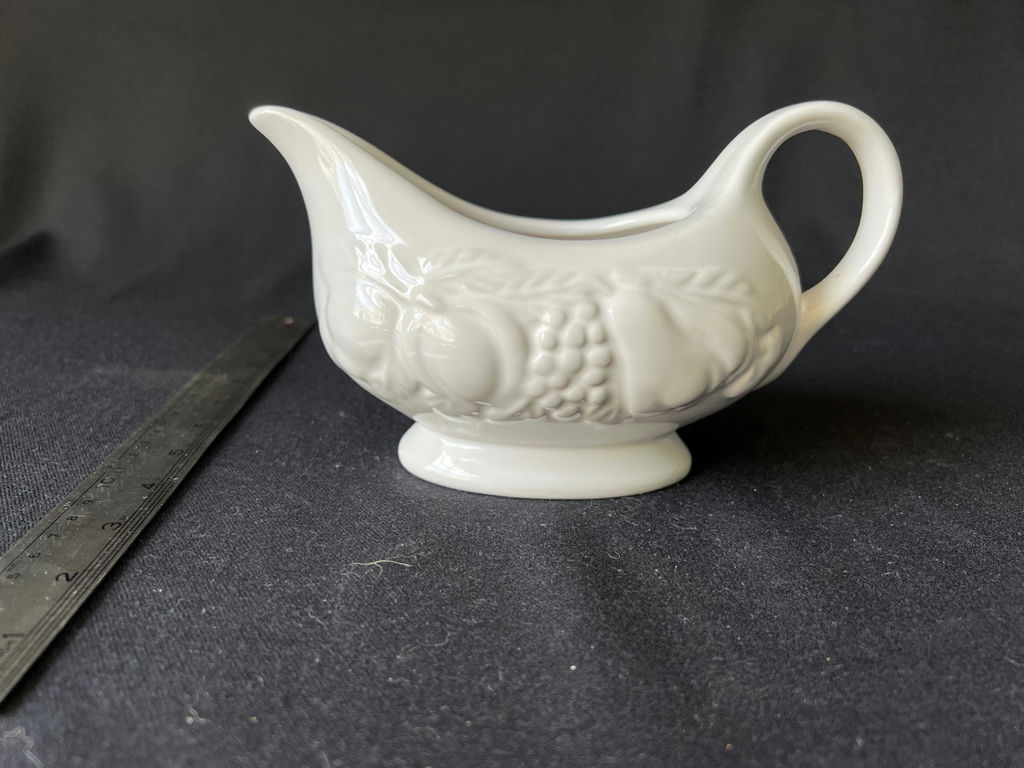 Vintage ceramic grape-pattern gravy boat, and blue embossed glass jar - image 1 of 7