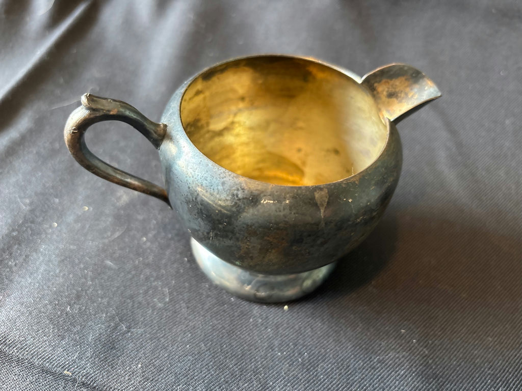 Vintage three-section shell-shaped serving dish with wooden handle, antique creamer pitcher, and embossed glass plate - image 5 of 8