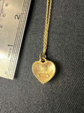 Gold-tone jewelry collection with heart pendant, charm bracelet, and drop earrings - thumbnail 2 of 18