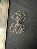 Gold-tone bracelet with engraved shield links, beaded hoop earrings, and a wire bow ornament - thumbnail 3 of 10