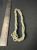 Beaded jewelry collection: leaf pendant, turquoise colored necklaces, cross pendant necklace, and bracelet - thumbnail 7 of 15