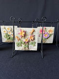 Floral embossed ceramic tiles on metal display stands, sculpted ceramic yellow rose - thumbnail 3 of 13