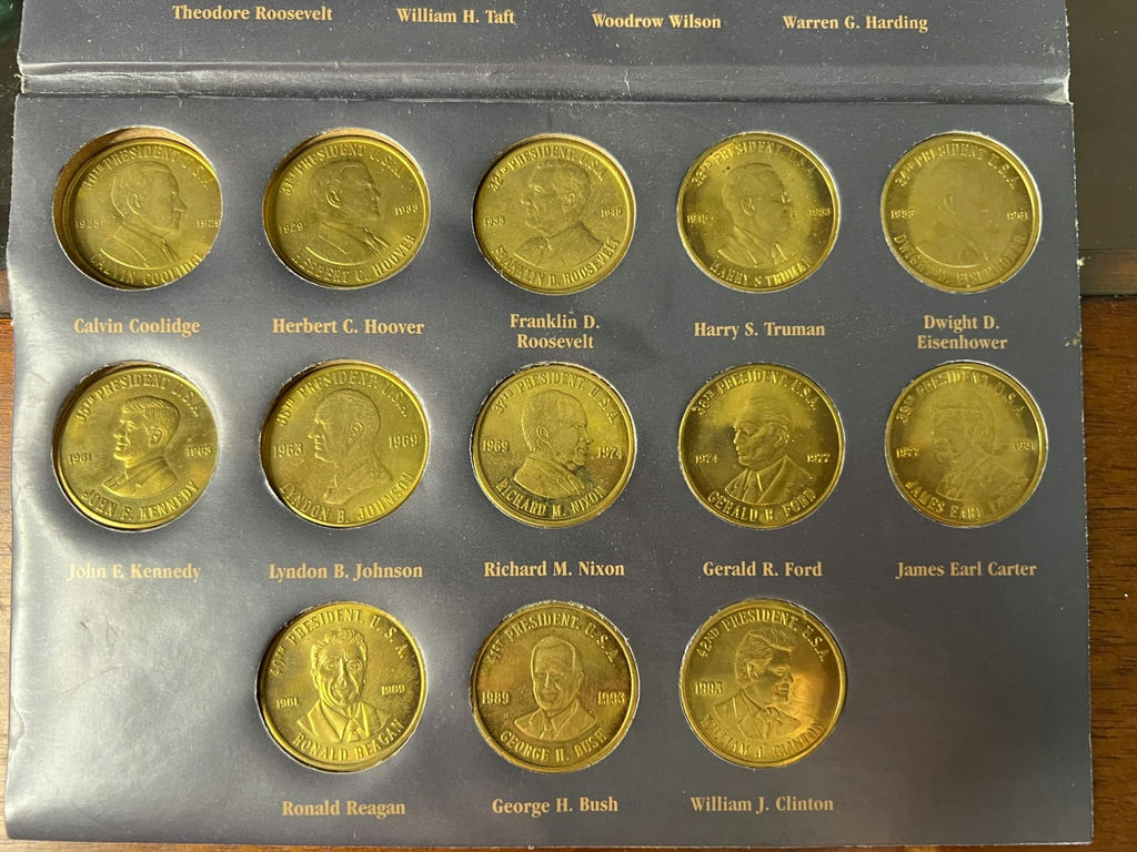 Blue album of U.S. Presidents coins - image 3 of 5