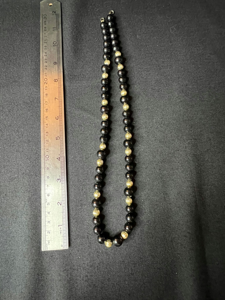 Beaded necklace collection in blue, black and gold tones - image 8 of 12