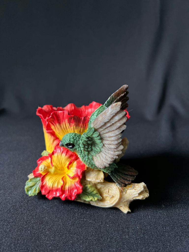 Colorful flower sculpture with hummingbird and cowboy figurine - image 5 of 11