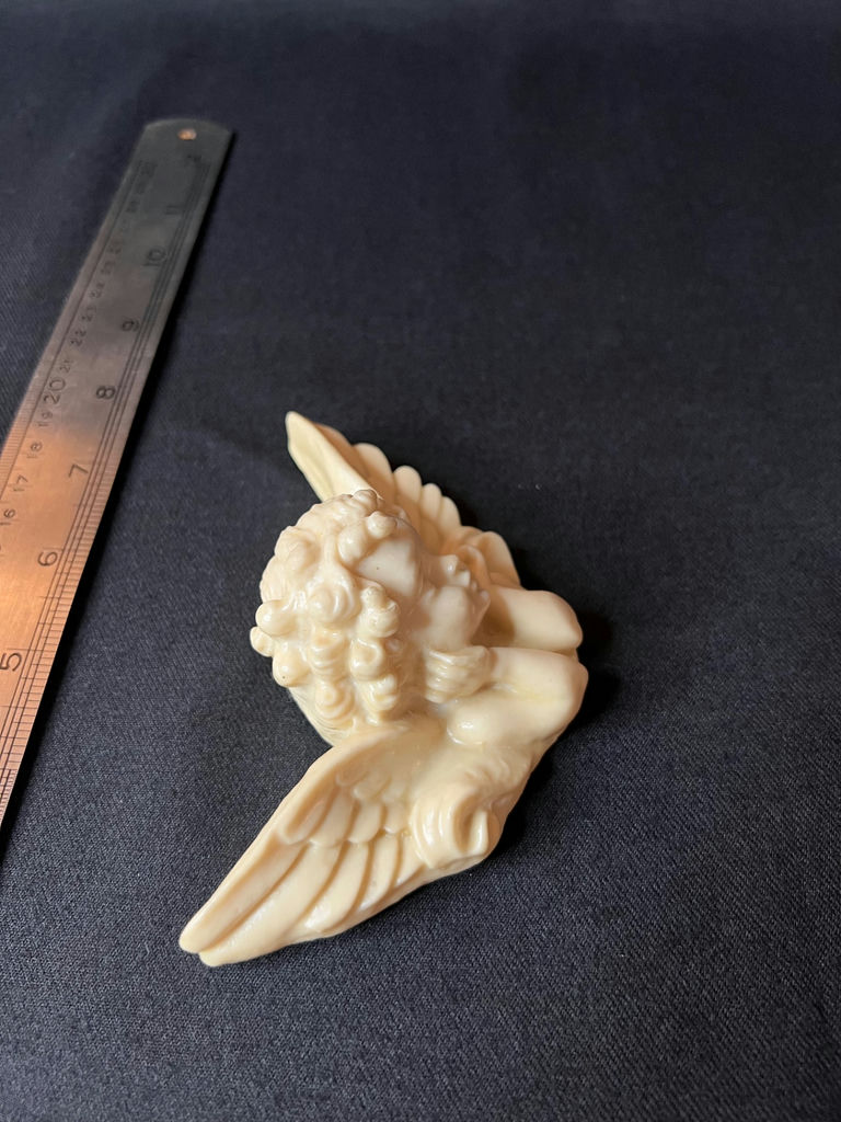 Cream-colored angel figurine and Angel music box - image 1 of 13