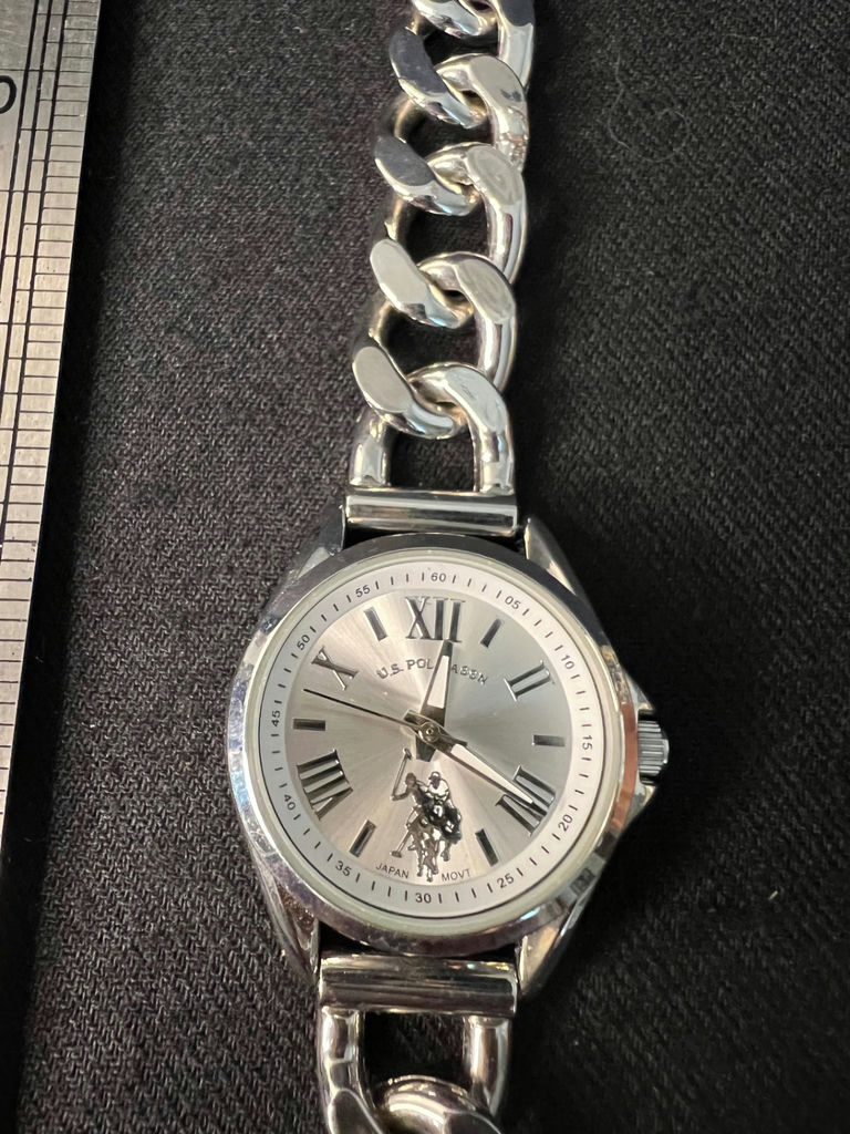 Silver wristwatch with chain-link bracelet and gold-tone adjustable necklace - image 1 of 9