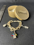 Gold-tone jewelry collection with heart pendant, charm bracelet, and drop earrings - thumbnail 12 of 18