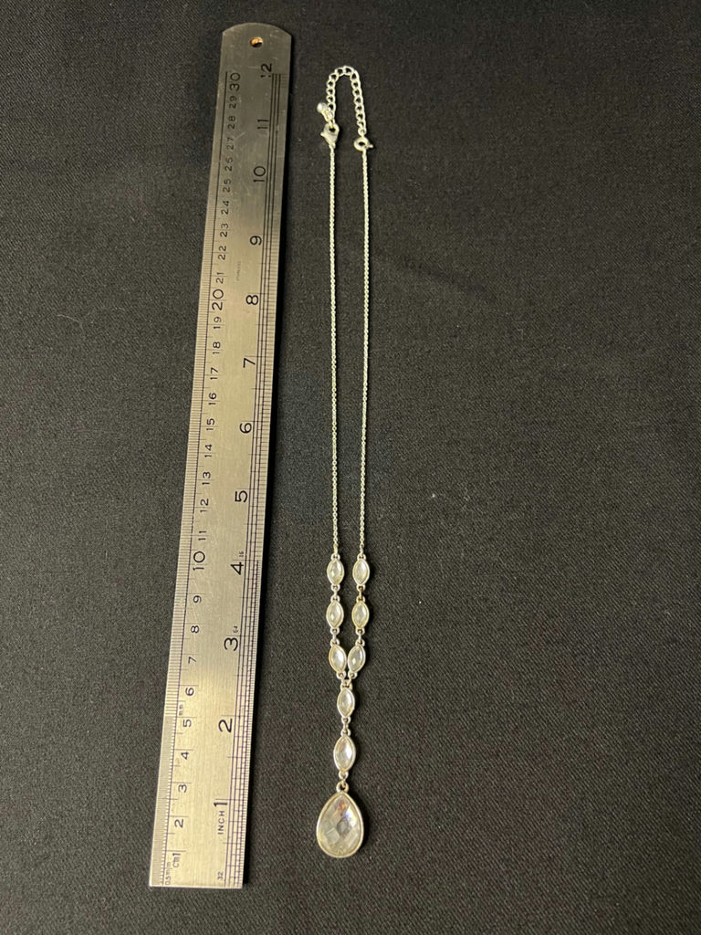 Silver-tone necklace with crystal drop pendant and one pair of shell earrings (blue enamel and gold-tone) - image 1 of 6