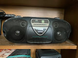 Collection of vintage boomboxes and media devices - thumbnail 1 of 22